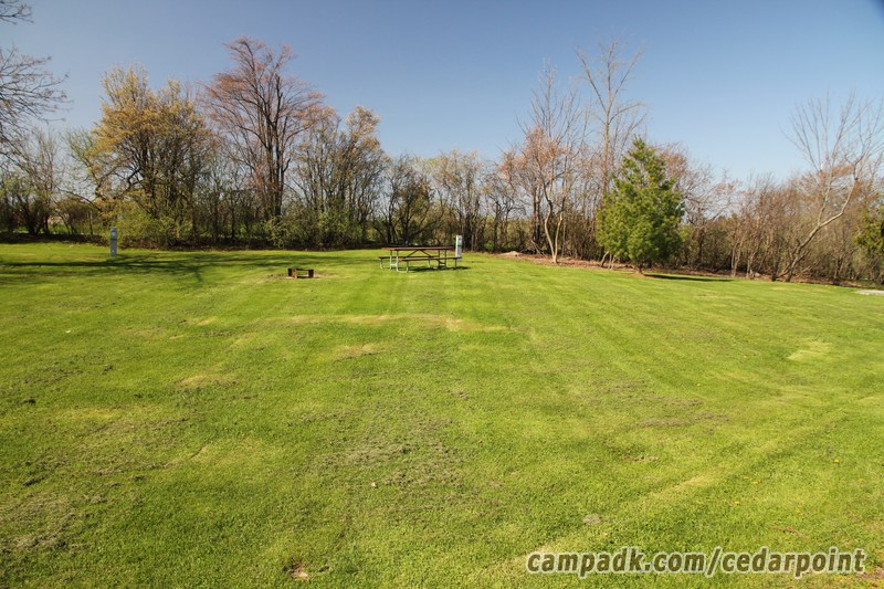 Campsite Photo of Site 179 at Cedar Point State Park, New York - Looking at Site from Road Sign Visible