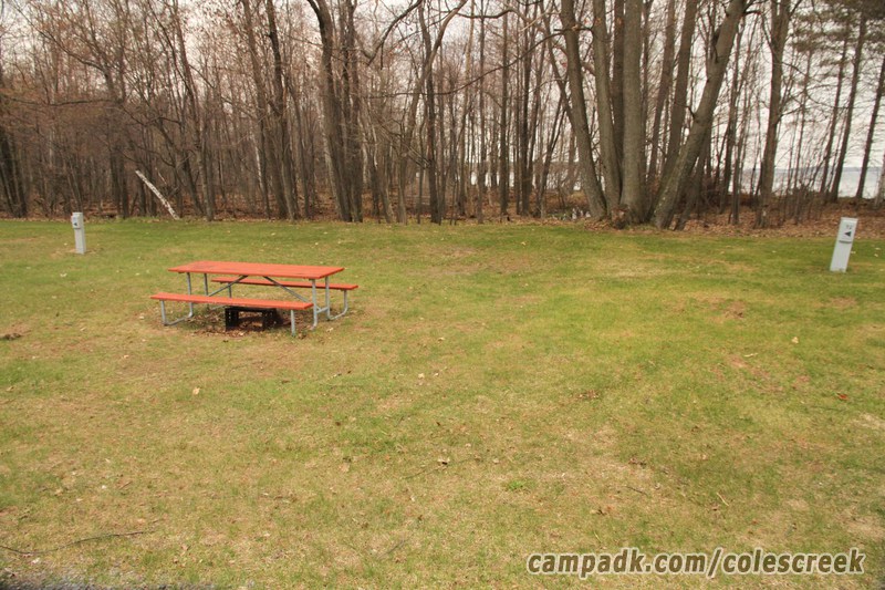 Campsite Photo of Site 72 at Coles Creek State Park, New York - Looking at Site from Road Sign Visible