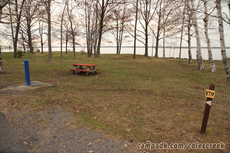 Campsite Photo of Site 179 at Coles Creek State Park, New York - Looking at Site from Road Sign Visible