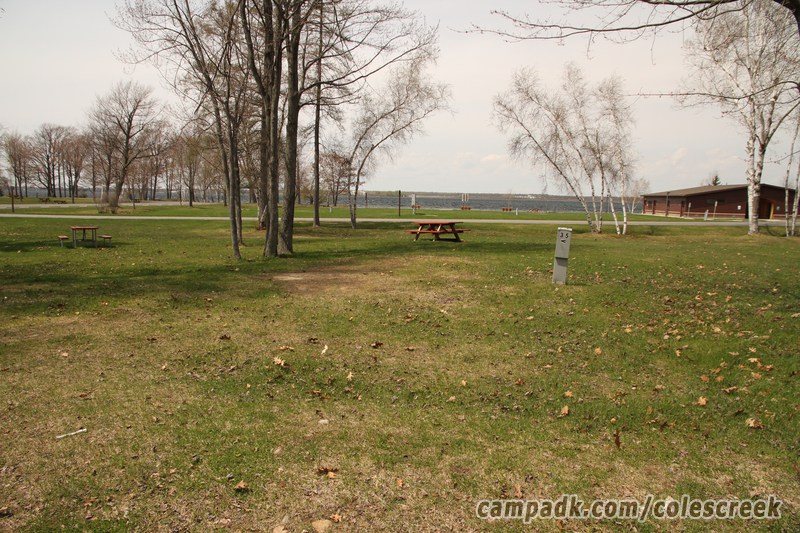 Campsite Photo of Site 35 at Coles Creek State Park, New York - Looking at Site from Road Sign Visible