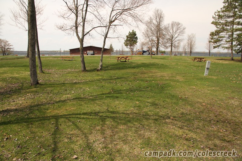 Campsite Photo of Site 40 at Coles Creek State Park, New York - Looking at Site from Road Sign Visible