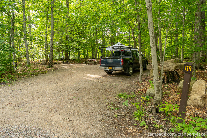 Campsite Photo of Site 119 at Cranberry Lake Campground, New York - Looking at Site from Road Sign Visible