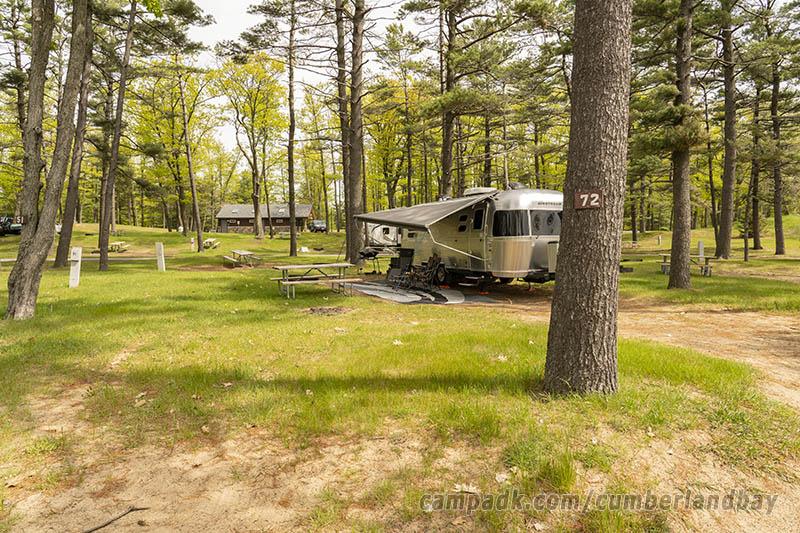 Campsite Photo of Site 72 at Cumberland Bay State Park, New York - Looking at Site from Road Sign Visible