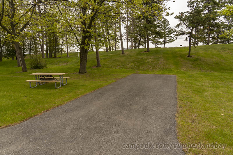 Campsite Photo of Site 89 at Cumberland Bay State Park, New York - Looking at Site from Road Sign Visible