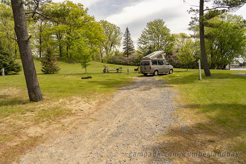 Campsite Photo of Site 41 at Cumberland Bay State Park, New York - Looking at Site from Road Sign Visible