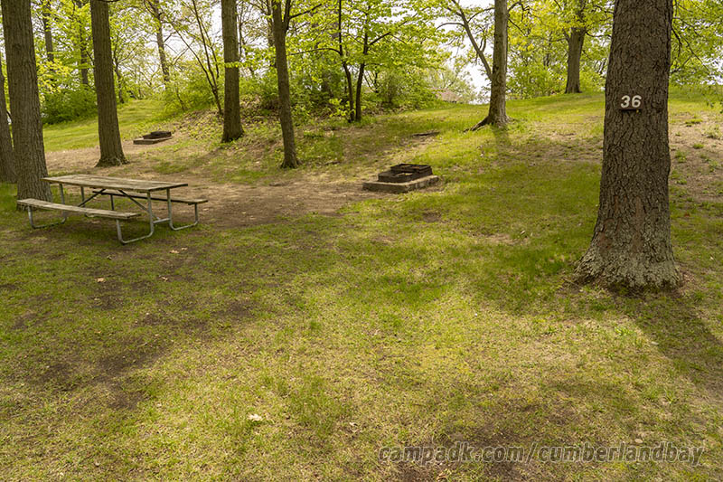 Campsite Photo of Site 36 at Cumberland Bay State Park, New York - Looking at Site from Road Sign Visible