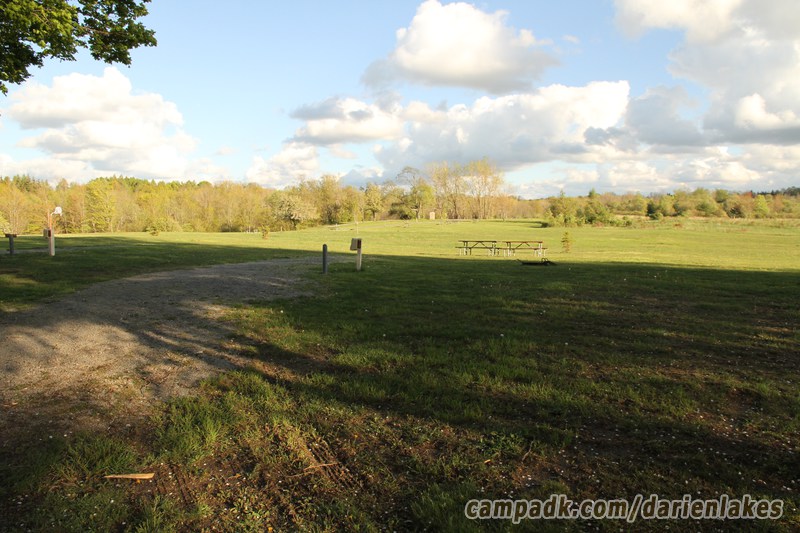 Campsite Photo of Site 10 at Darien Lakes State Park, New York - Looking at Site from Road Sign Visible