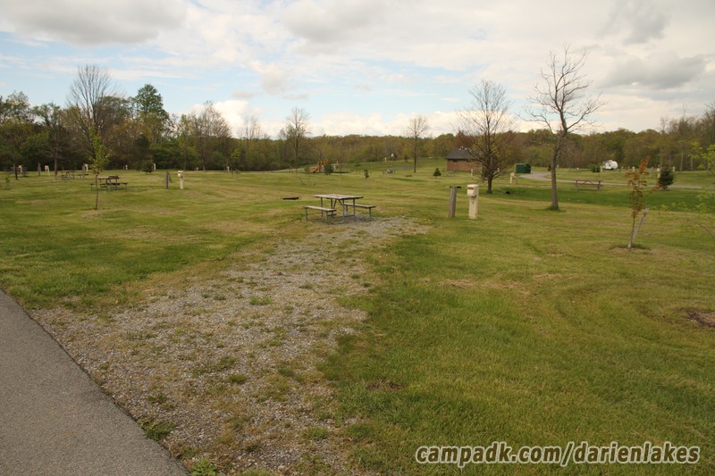Campsite Photo of Site 116 at Darien Lakes State Park, New York - Looking at Site from Road Sign Visible