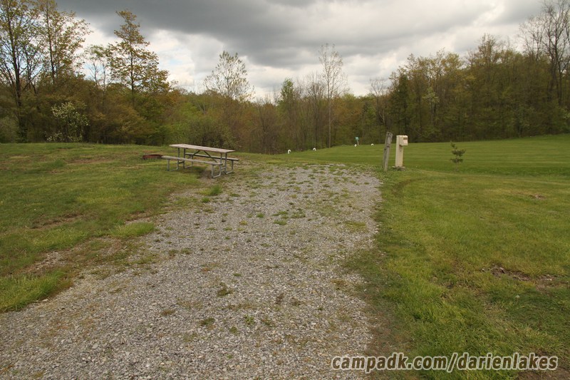 Campsite Photo of Site 91 at Darien Lakes State Park, New York - Looking at Site from Road Sign Visible