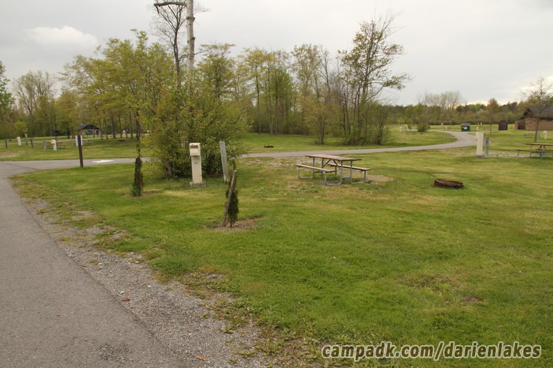 Campsite Photo of Site 141 at Darien Lakes State Park, New York - Looking at Site from Road Sign Visible