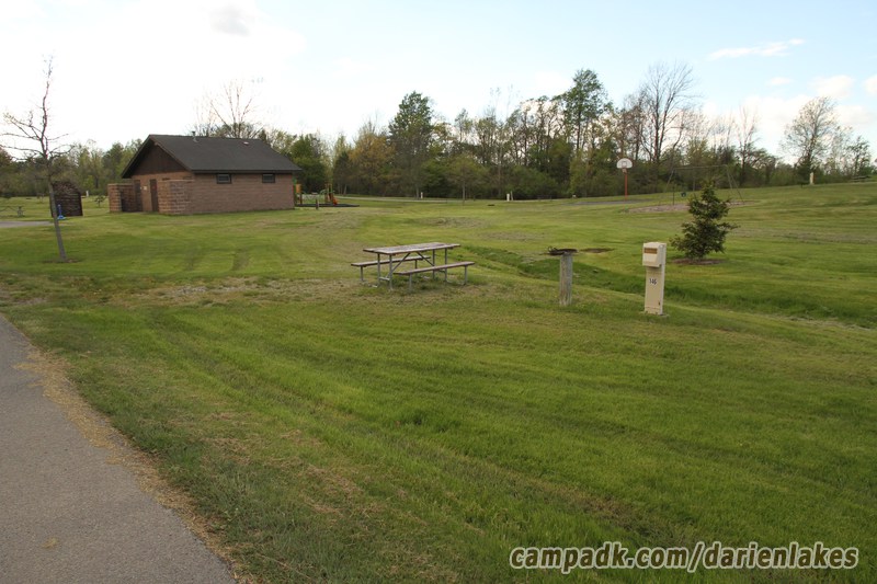 Campsite Photo of Site 146 at Darien Lakes State Park, New York - Looking at Site from Road Sign Visible