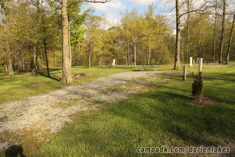 Campsite Photo of Site 66 at Darien Lakes State Park, New York - Looking at Site from Road Sign Visible
