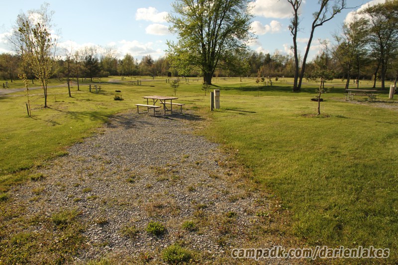 Campsite Photo of Site 126 at Darien Lakes State Park, New York - Looking at Site from Road Sign Visible