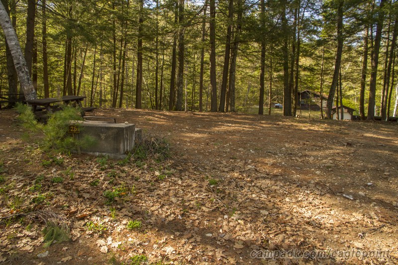 Campsite Photo of Site 25 at Eagle Point Campground, New York - Looking at Site from Road Sign Visible