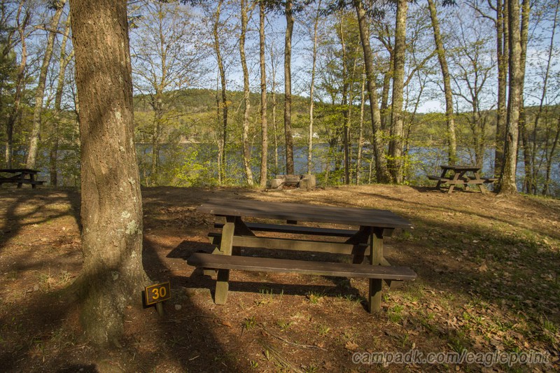 Campsite Photo of Site 30 at Eagle Point Campground, New York - Looking at Site from Road Sign Visible