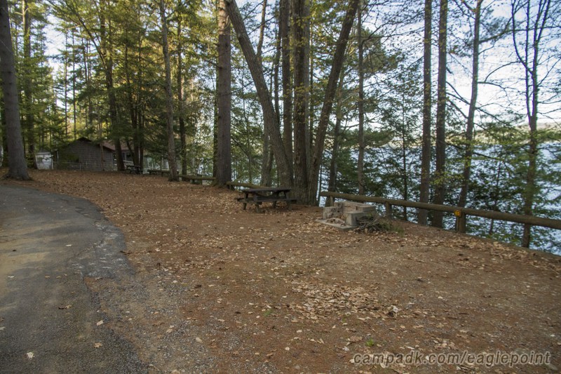 Campsite Photo of Site 65 at Eagle Point Campground, New York - Looking at Site from Road Sign Visible
