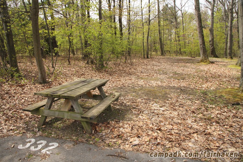 Campsite Photo of Site 332 at Fair Haven Beach State Park, New York - Looking at Site from Road Sign Visible