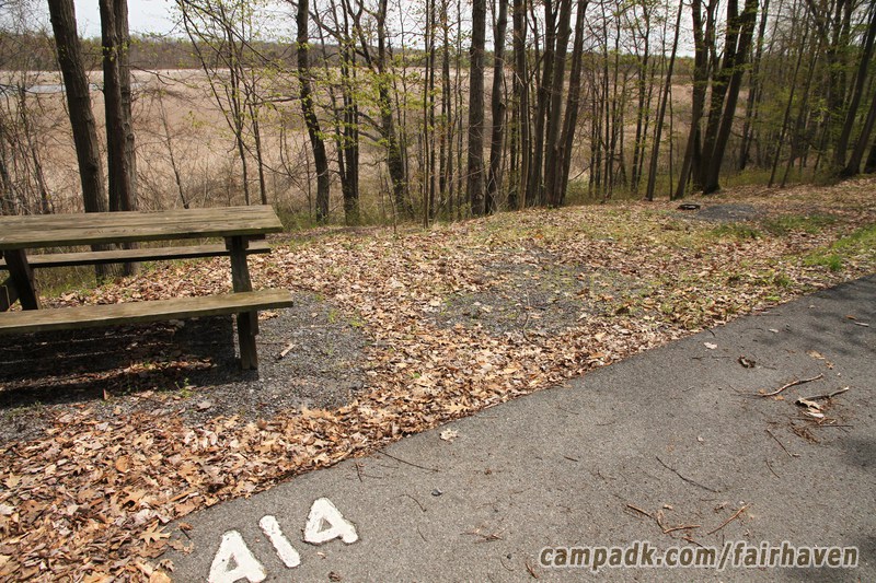 Campsite Photo of Site 414 at Fair Haven Beach State Park, New York - Looking at Site from Road Sign Visible