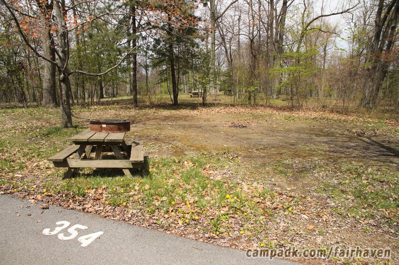 Campsite Photo of Site 354 at Fair Haven Beach State Park, New York - Looking at Site from Road Sign Visible
