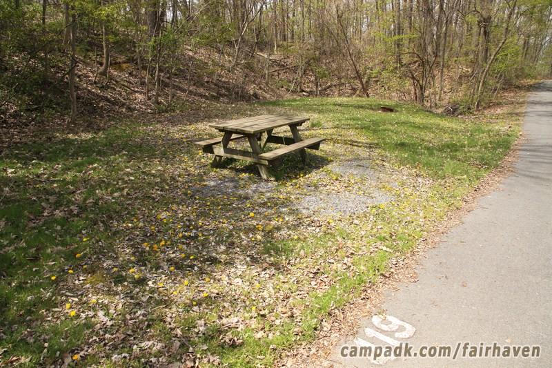 Campsite Photo of Site 419 at Fair Haven Beach State Park, New York - Looking at Site from Road Sign Visible