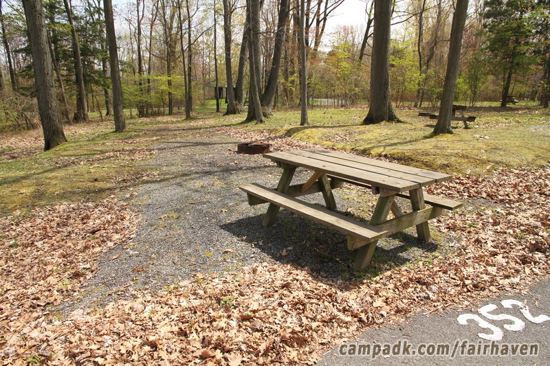 Campsite Photo of Site 352 at Fair Haven Beach State Park, New York - Looking at Site from Road Sign Visible