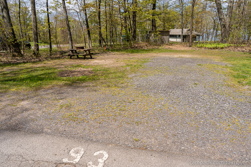 Campsite Photo of Site 93 at Fair Haven Beach State Park, New York - Looking at Site from Road Sign Visible
