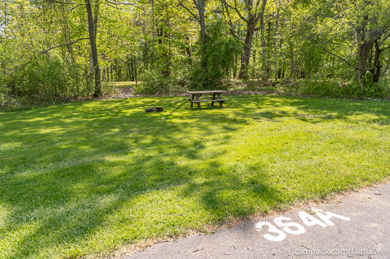 Campsite Photo of Site 364A at Fair Haven Beach State Park, New York - Looking at Site from Road Sign Visible