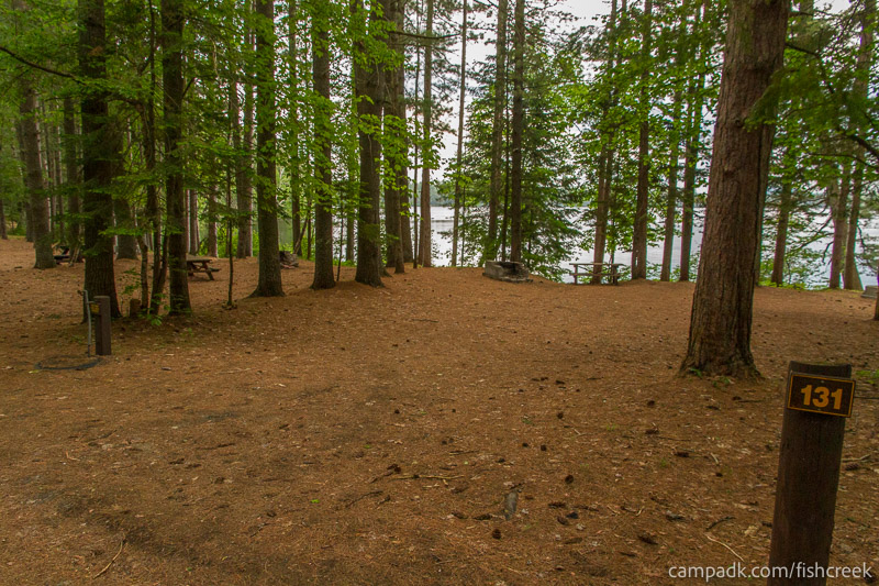 Campsite Photo of Site 163 at Fish Creek Pond Campground, New York - Looking at Site from Road Sign Visible