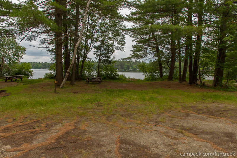 Campsite Photo of Site 32 at Fish Creek Pond Campground, New York - Looking at Site from Road Sign Visible