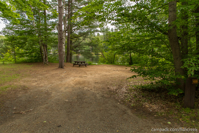 Campsite Photo of Site 189 at Fish Creek Pond Campground, New York - Looking at Site from Road Sign Visible