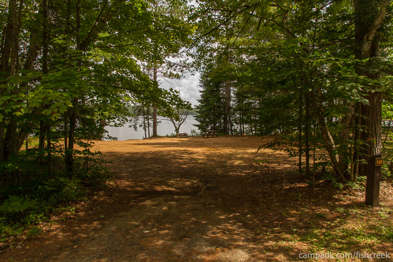 Campsite Photo of Site 171 at Fish Creek Pond Campground, New York - Looking at Site from Road Sign Visible