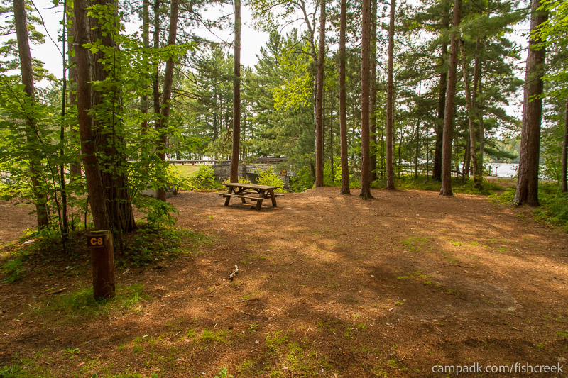 Campsite Photo of Site 37 at Fish Creek Pond Campground, New York - Looking at Site from Road Sign Visible