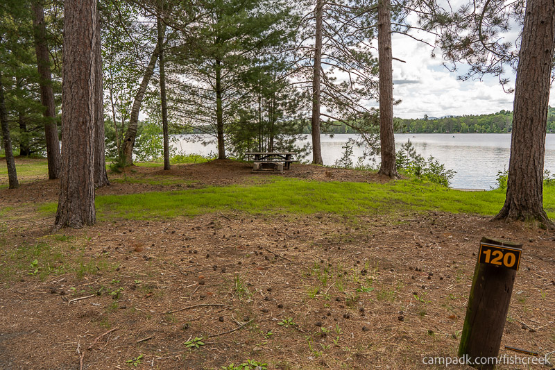 Campsite Photo of Site 152 at Fish Creek Pond Campground, New York - Looking at Site from Road Sign Visible
