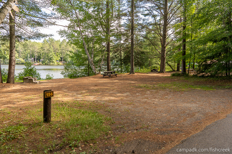 Campsite Photo of Site 186 at Fish Creek Pond Campground, New York - Looking at Site from Road Sign Visible