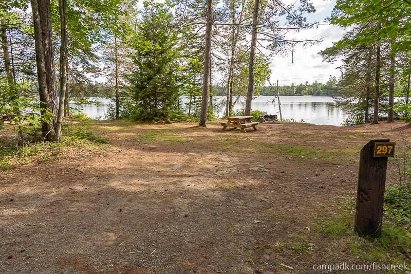 Campsite Photo of Site 323 at Fish Creek Pond Campground, New York - Looking at Site from Road Sign Visible