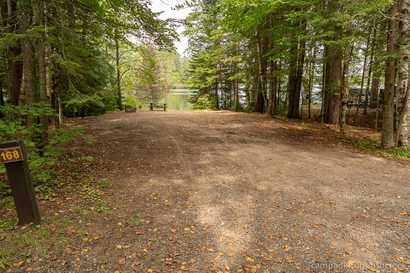 Campsite Photo of Site 197 at Fish Creek Pond Campground, New York - Looking at Site from Road Sign Visible
