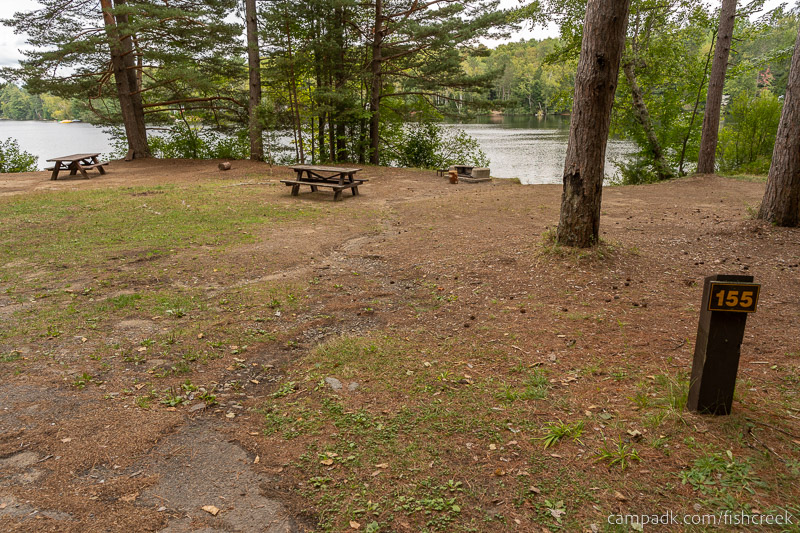 Campsite Photo of Site 185 at Fish Creek Pond Campground, New York - Looking at Site from Road Sign Visible