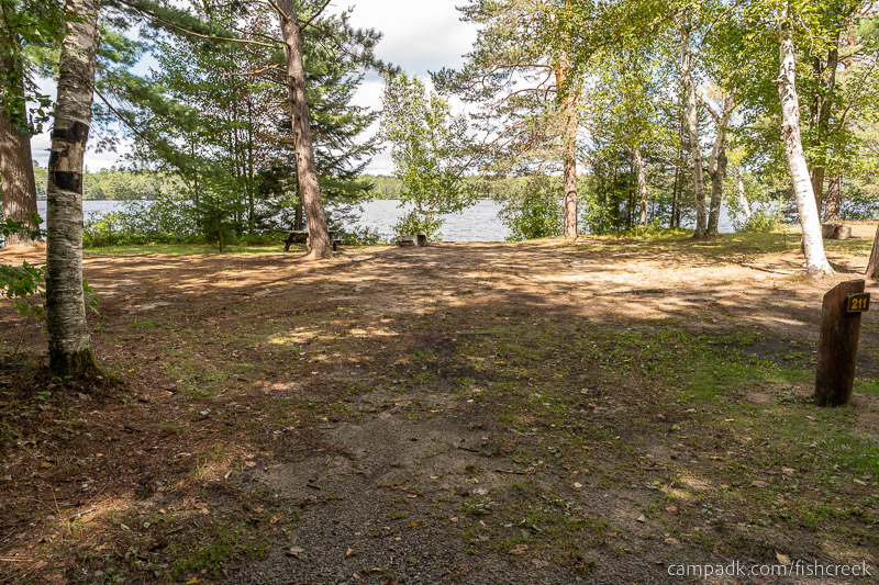 Campsite Photo of Site 239 at Fish Creek Pond Campground, New York - Looking at Site from Road Sign Visible