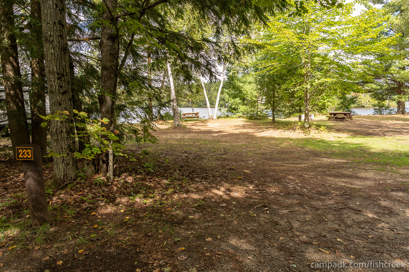 Campsite Photo of Site 261 at Fish Creek Pond Campground, New York - Looking at Site from Road Sign Visible