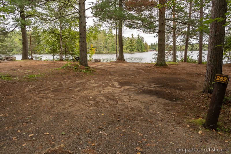 Campsite Photo of Site 280 at Fish Creek Pond Campground, New York - Looking at Site from Road Sign Visible