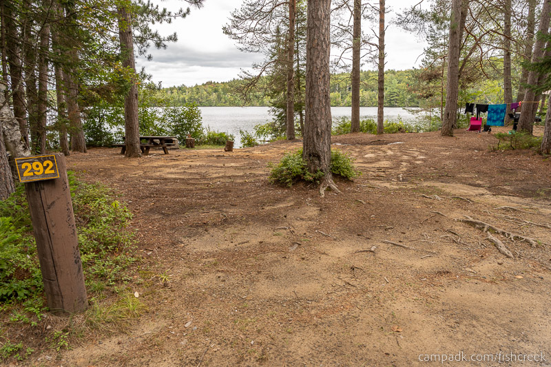 Campsite Photo of Site 318 at Fish Creek Pond Campground, New York - Looking at Site from Road Sign Visible
