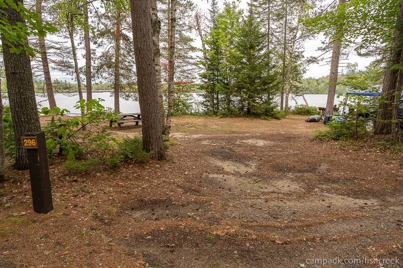 Campsite Photo of Site 322 at Fish Creek Pond Campground, New York - Looking at Site from Road Sign Visible
