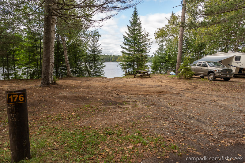 Campsite Photo of Site 205 at Fish Creek Pond Campground, New York - Looking at Site from Road Sign Visible