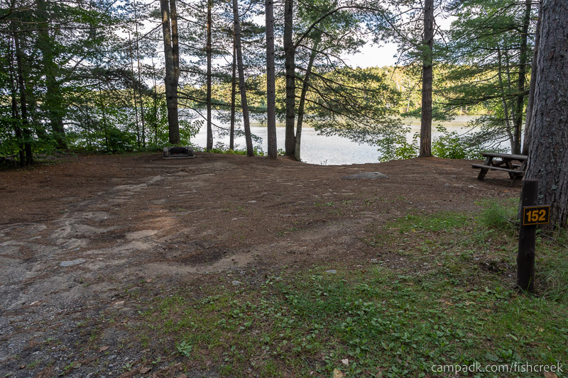 Campsite Photo of Site 182 at Fish Creek Pond Campground, New York - Looking at Site from Road Sign Visible
