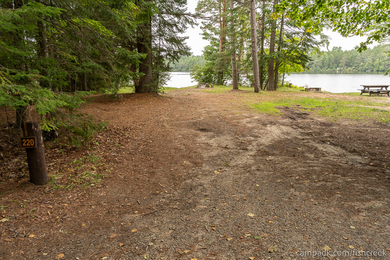 Campsite Photo of Site 248 at Fish Creek Pond Campground, New York - Looking at Site from Road Sign Visible