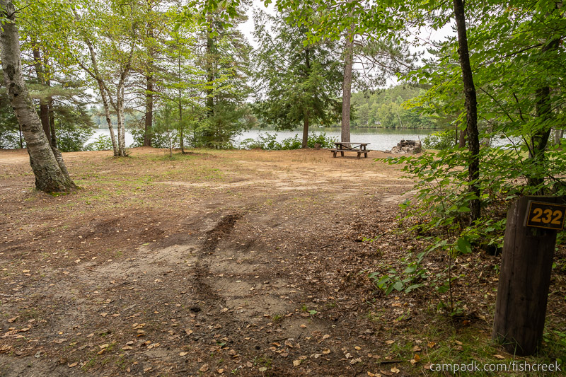 Campsite Photo of Site 260 at Fish Creek Pond Campground, New York - Looking at Site from Road Sign Visible