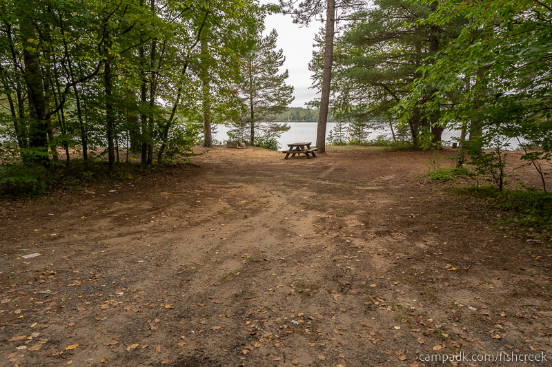 Campsite Photo of Site 285 at Fish Creek Pond Campground, New York - Looking at Site from Road