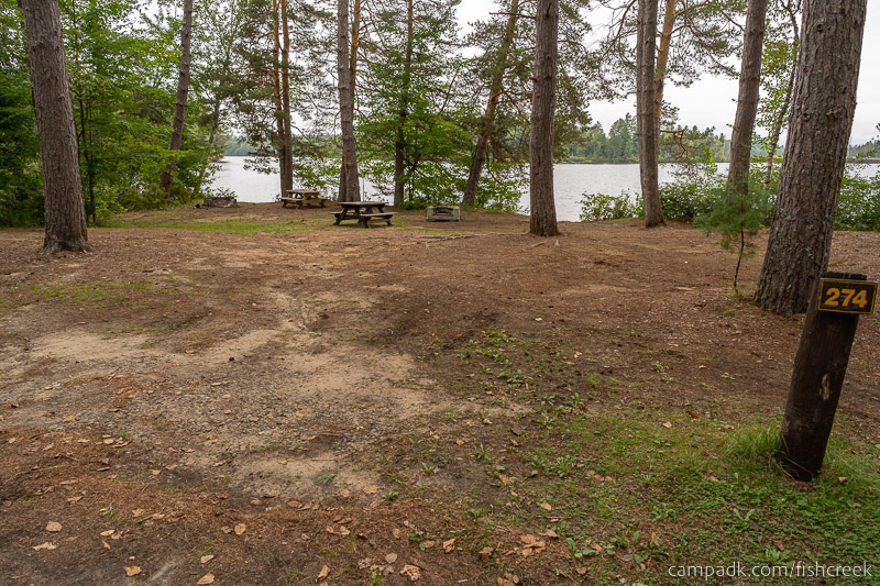 Campsite Photo of Site 302 at Fish Creek Pond Campground, New York - Looking at Site from Road Sign Visible