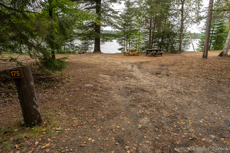 Campsite Photo of Site 204 at Fish Creek Pond Campground, New York - Looking at Site from Road Sign Visible