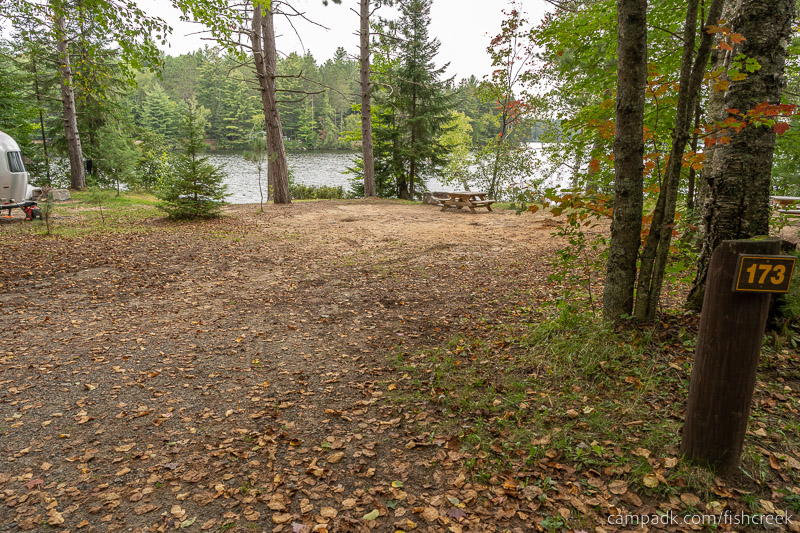 Campsite Photo of Site 202 at Fish Creek Pond Campground, New York - Looking at Site from Road Sign Visible